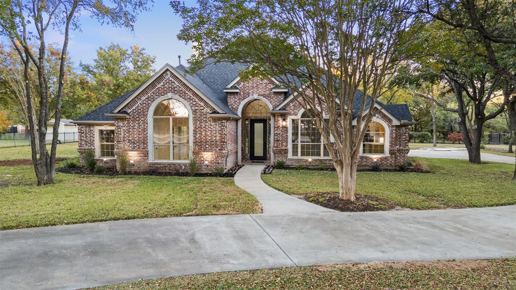 615 West Aurora Vista Trail Aurora, TX 76078 - Photo 2 of 40 a front view of a house with a yard