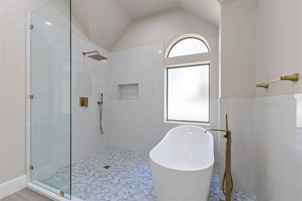 615 West Aurora Vista Trail Aurora, TX 76078 - Photo 20 of 40 a bathroom with a sink toilet and shower