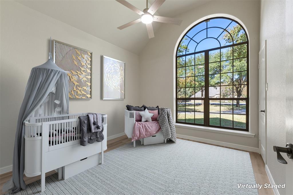 615 West Aurora Vista Trail Aurora, TX 76078 - Photo 23 of 40 a spacious bedroom with a bed and a window