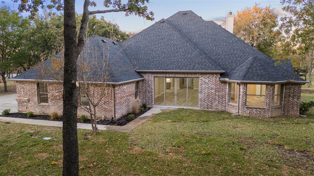615 West Aurora Vista Trail Aurora, TX 76078 - Photo 35 of 40 a house view with a outdoor space