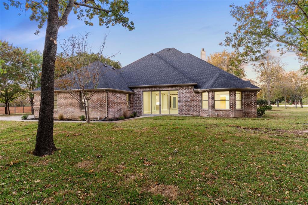 615 West Aurora Vista Trail Aurora, TX 76078 - Photo 38 of 40 a view of a house with a yard