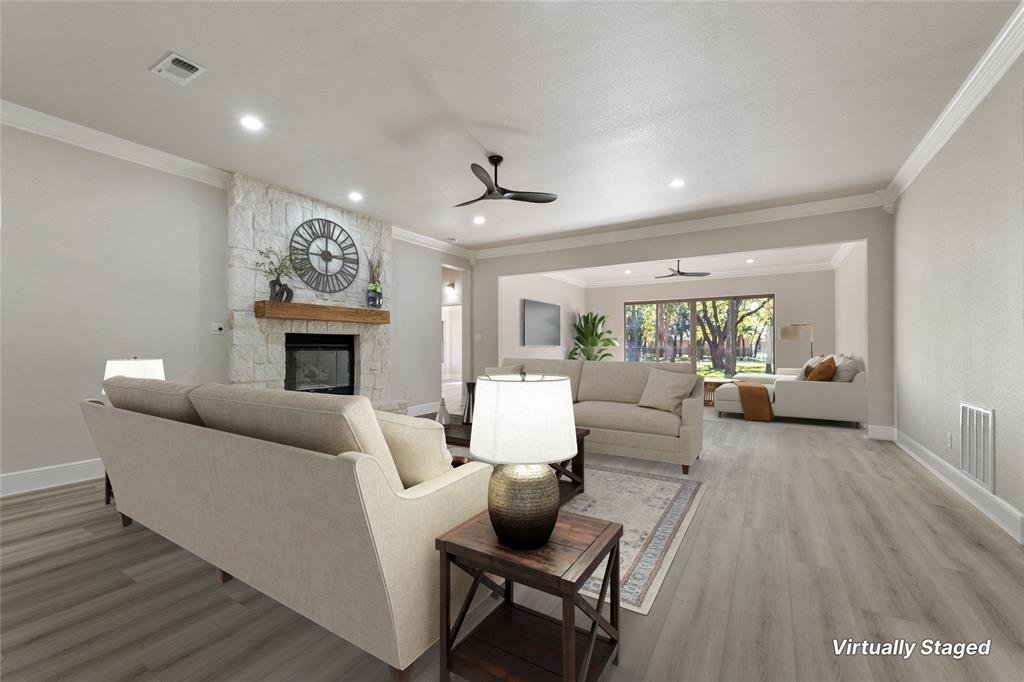 615 West Aurora Vista Trail Aurora, TX 76078 - Photo 6 of 40 a living room with furniture and a fireplace