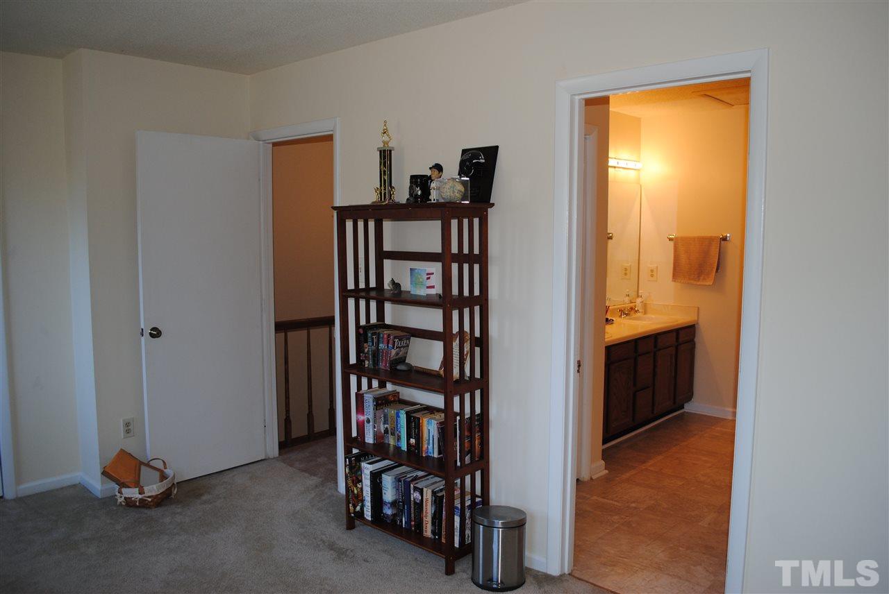 5408 Ridgeloch Place Raleigh, NC 27612 - Photo 20 of 25 a view of a hallway with closet area