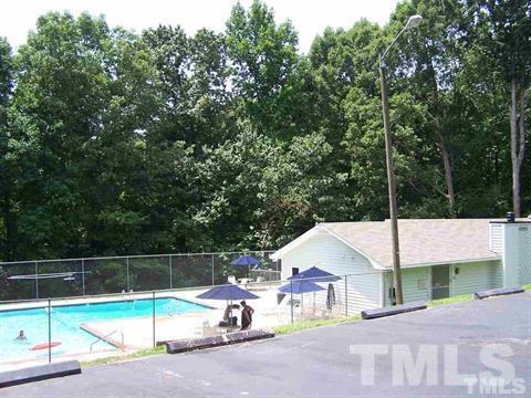 5408 Ridgeloch Place Raleigh, NC 27612 - Photo 22 of 25 a view of backyard with wheel