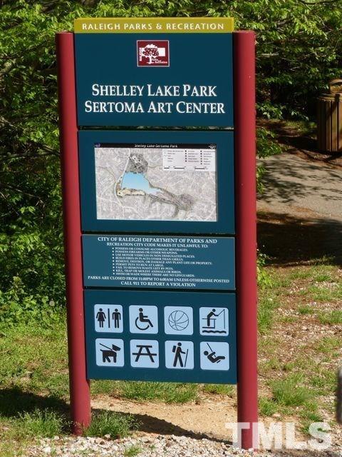 5408 Ridgeloch Place Raleigh, NC 27612 - Photo 24 of 25 a sign broad in front of a tree