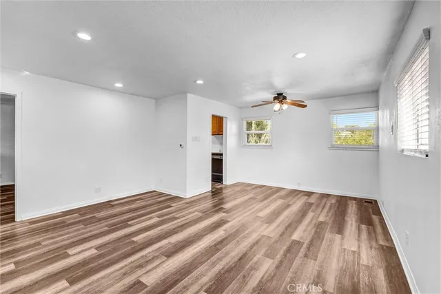 a view of an empty room and window