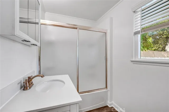 a bathroom with a sink and a vanity
