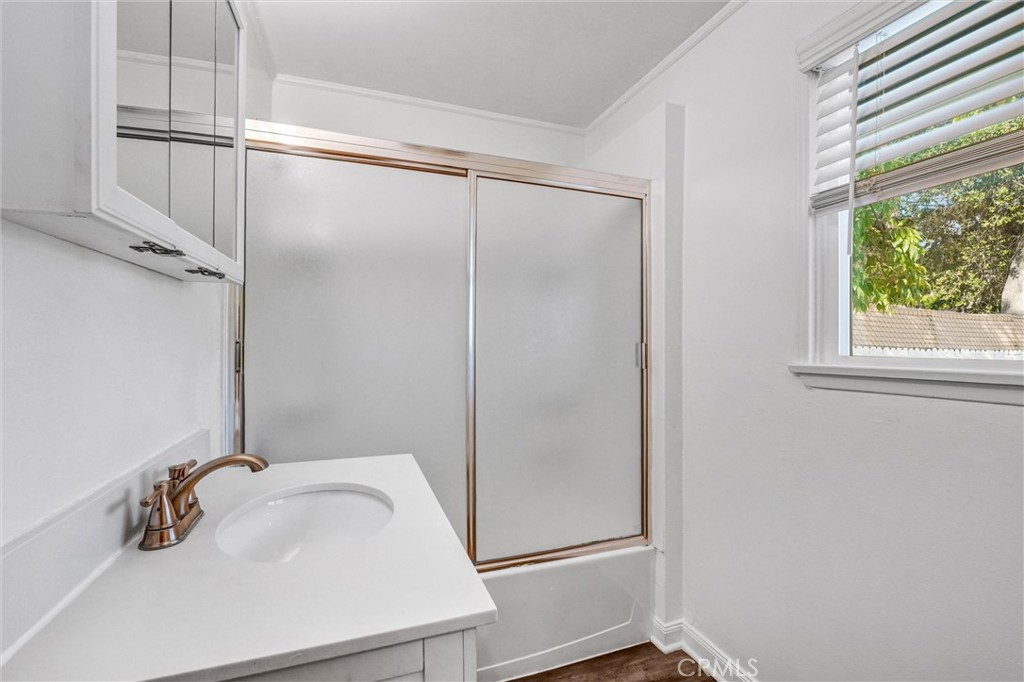 9246 Rowell Avenue Chatsworth, CA 91311 - Photo 18 of 22 a bathroom with a sink and a vanity