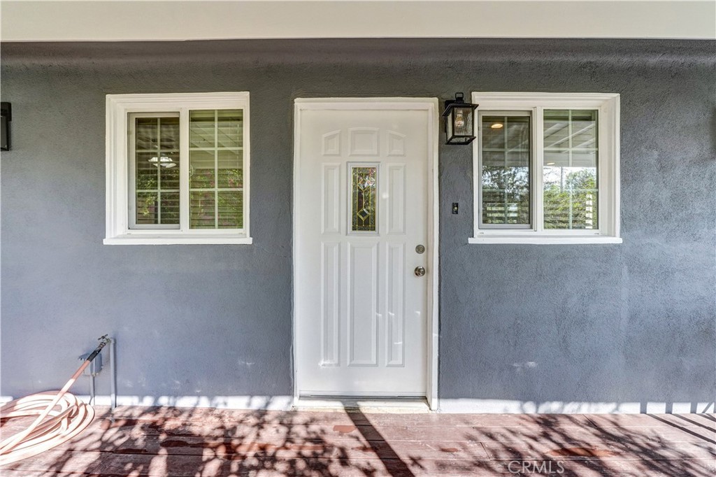 9246 Rowell Avenue Chatsworth, CA 91311 - Photo 2 of 22 a front view of a house