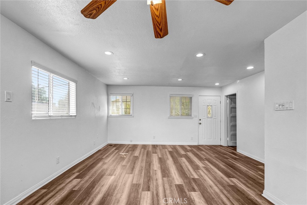 9246 Rowell Avenue Chatsworth, CA 91311 - Photo 8 of 22 a view of a room with wooden floor and window