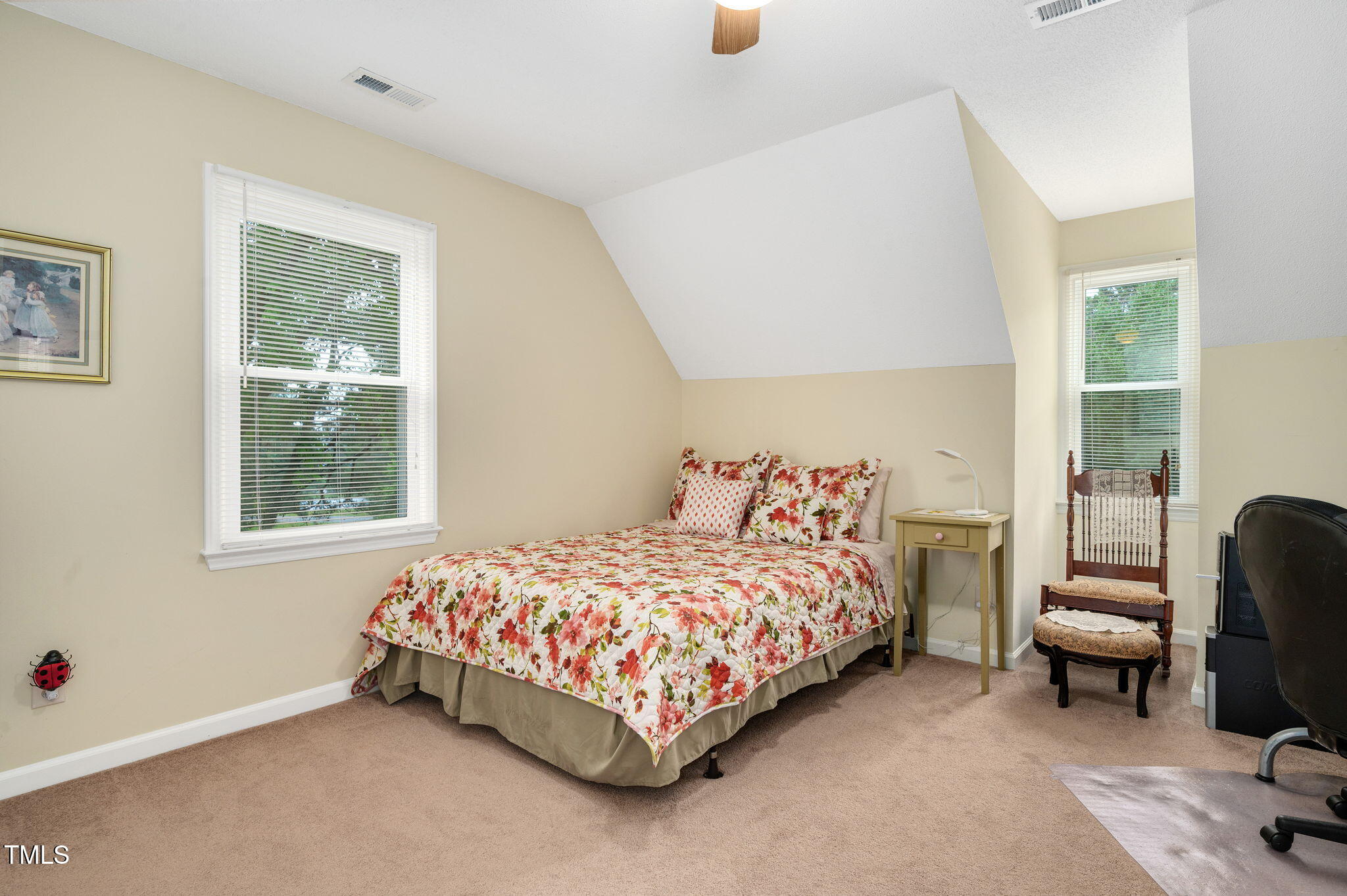 124 Windmere Drive Angier, NC 27501 - Photo 26 of 39 a bedroom with a bed and a window