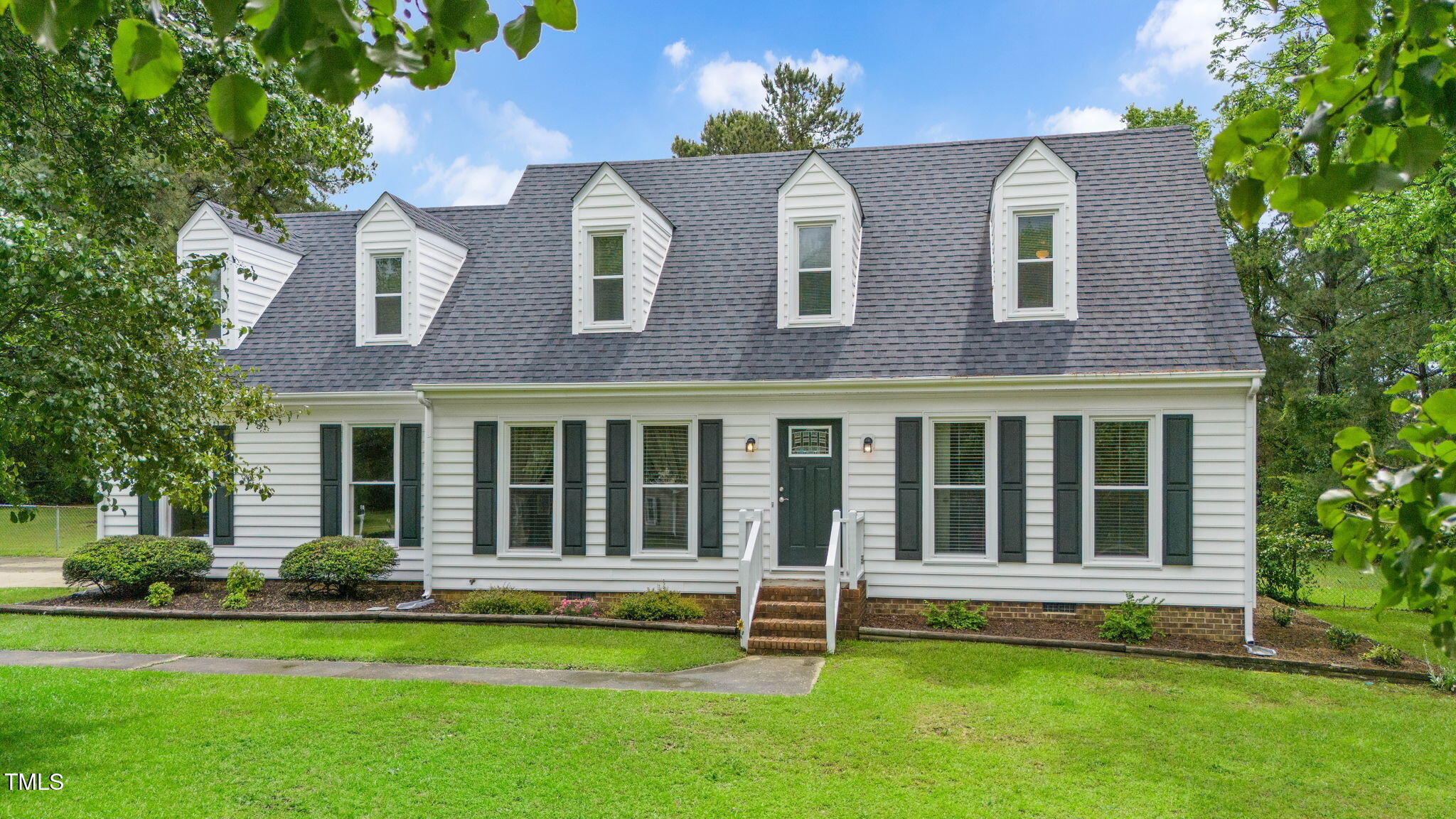 124 Windmere Drive Angier, NC 27501 - Photo 2 of 39 front view of a house with a yard