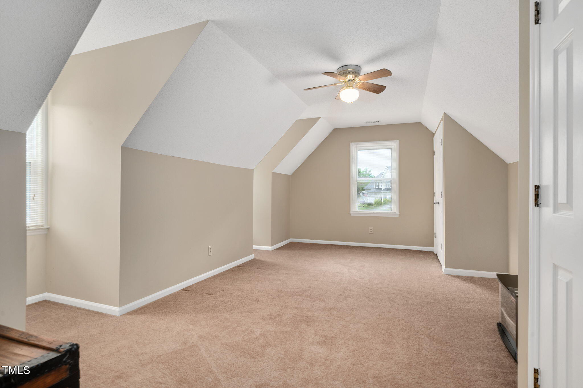 124 Windmere Drive Angier, NC 27501 - Photo 31 of 39 a view of a chandelier fan and livingroom