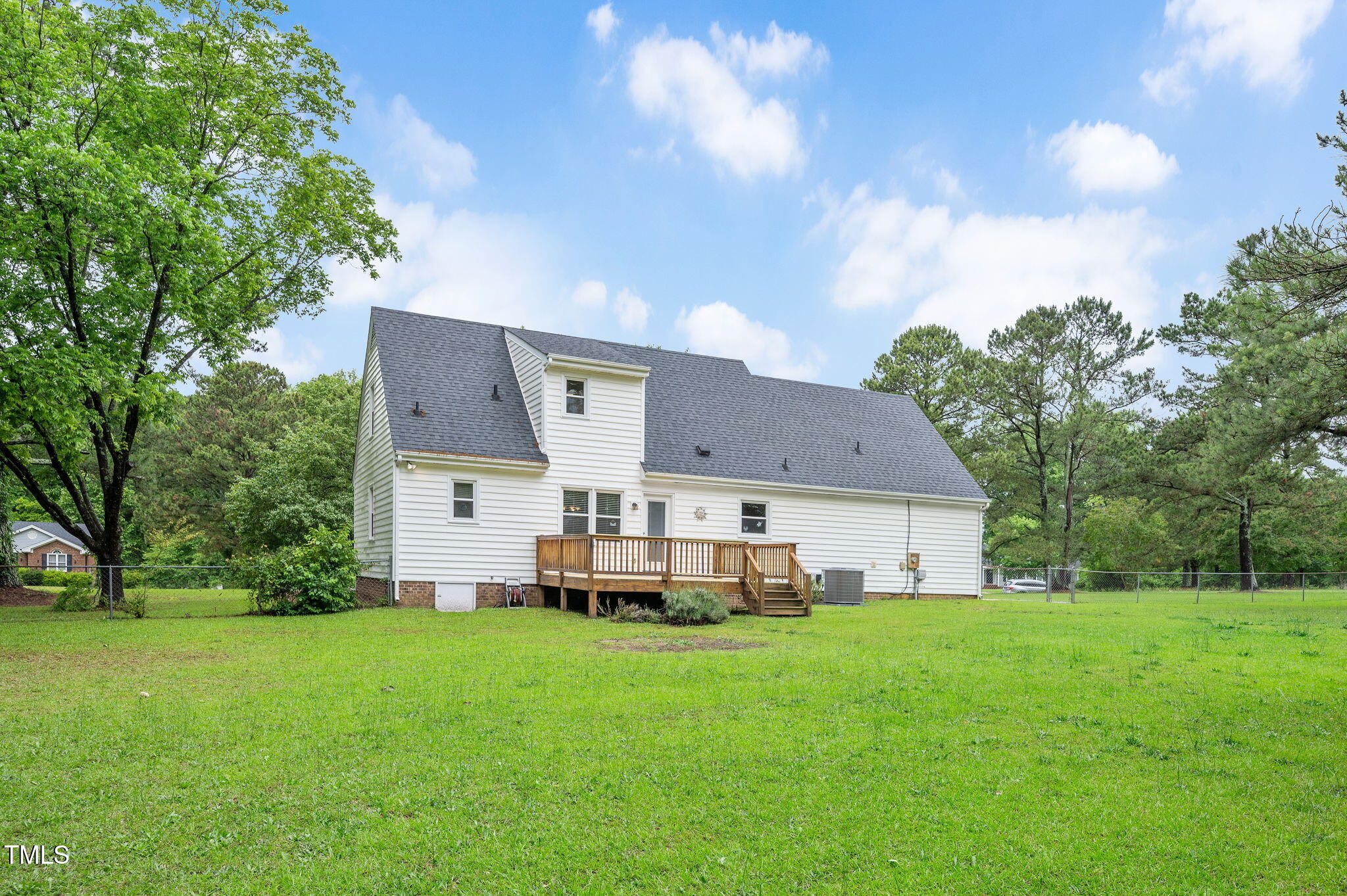 124 Windmere Drive Angier, NC 27501 - Photo 38 of 39 a front view of house with yard and trees in the background