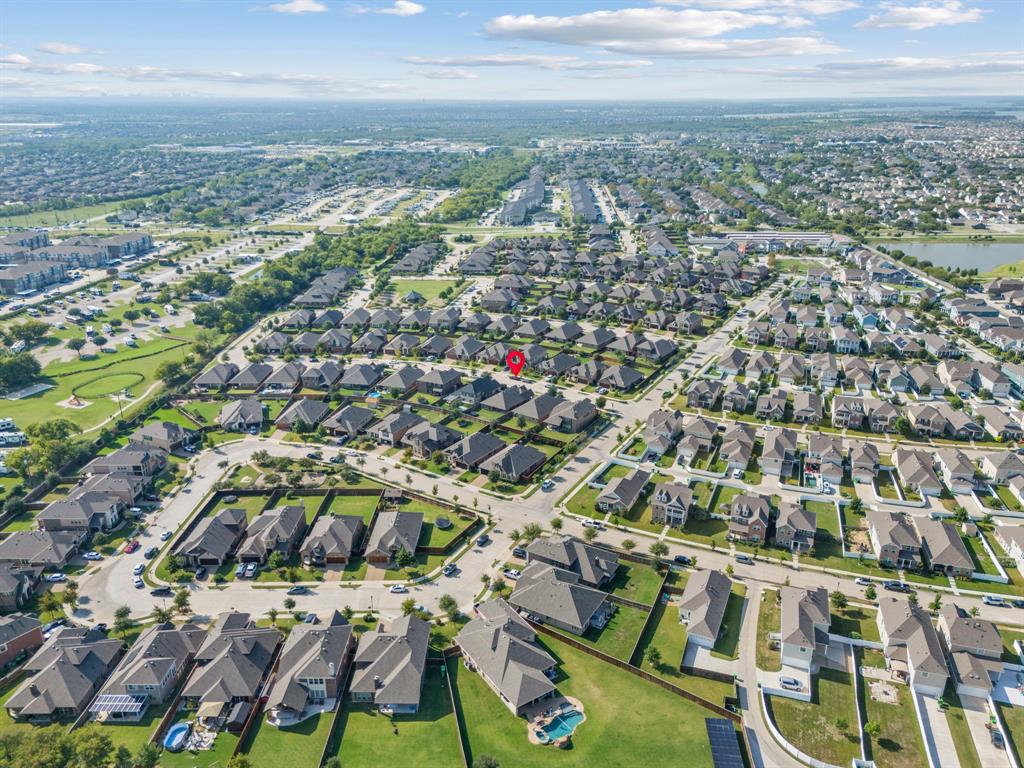1609 Emerald Tree Place Aubrey, TX 76227 - Photo 35 of 39 an aerial view of multiple house