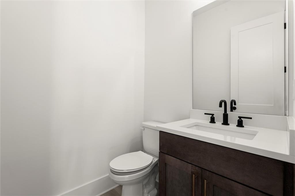 437 Mezzo Lane, Unit 87 Alpharetta, GA 30009 - Photo 17 of 46 a bathroom with a sink and a toilet