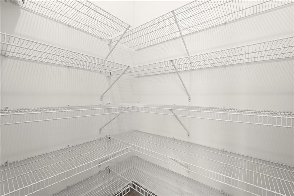 437 Mezzo Lane, Unit 87 Alpharetta, GA 30009 - Photo 18 of 46 a view of a room with racks on the wall