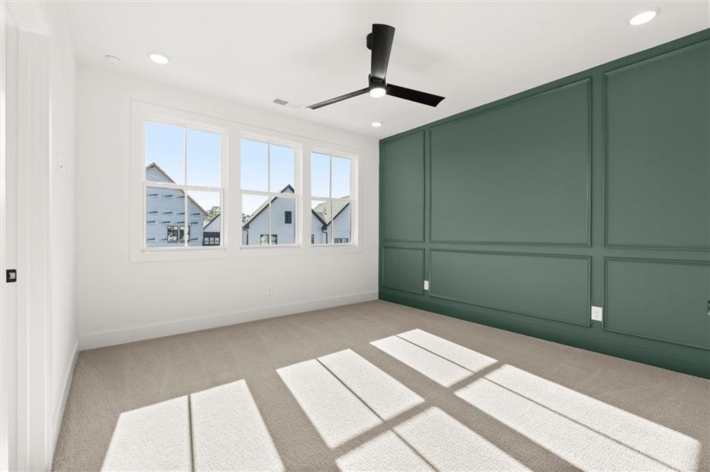 437 Mezzo Lane, Unit 87 Alpharetta, GA 30009 - Photo 22 of 46 a view of an empty room with a window