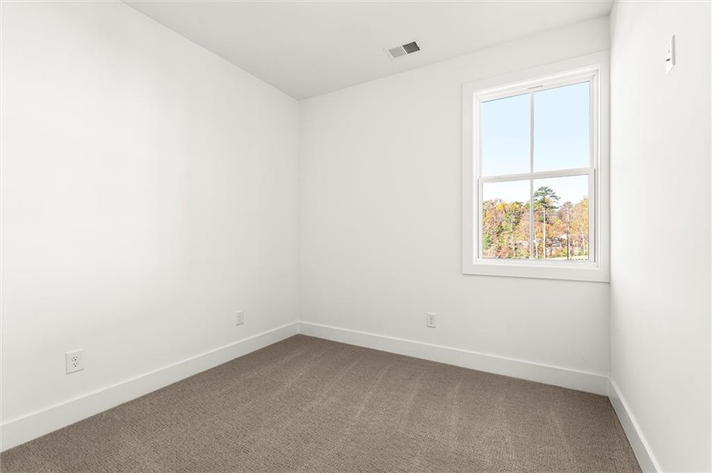 437 Mezzo Lane, Unit 87 Alpharetta, GA 30009 - Photo 30 of 46 an empty room with a window