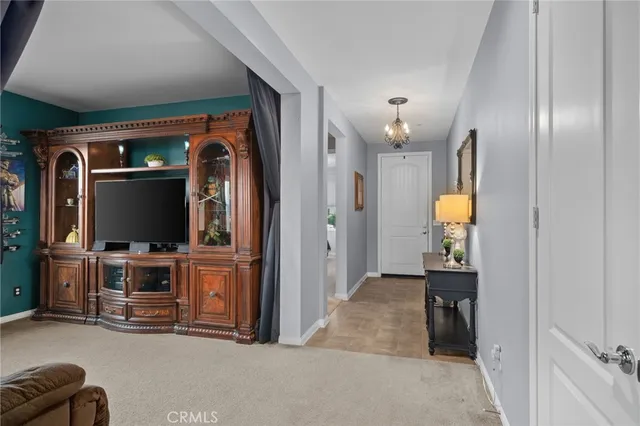 a view of a livingroom with furniture and windows
