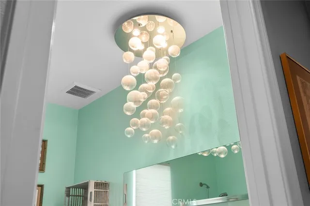 a bathroom with a sink and mirror