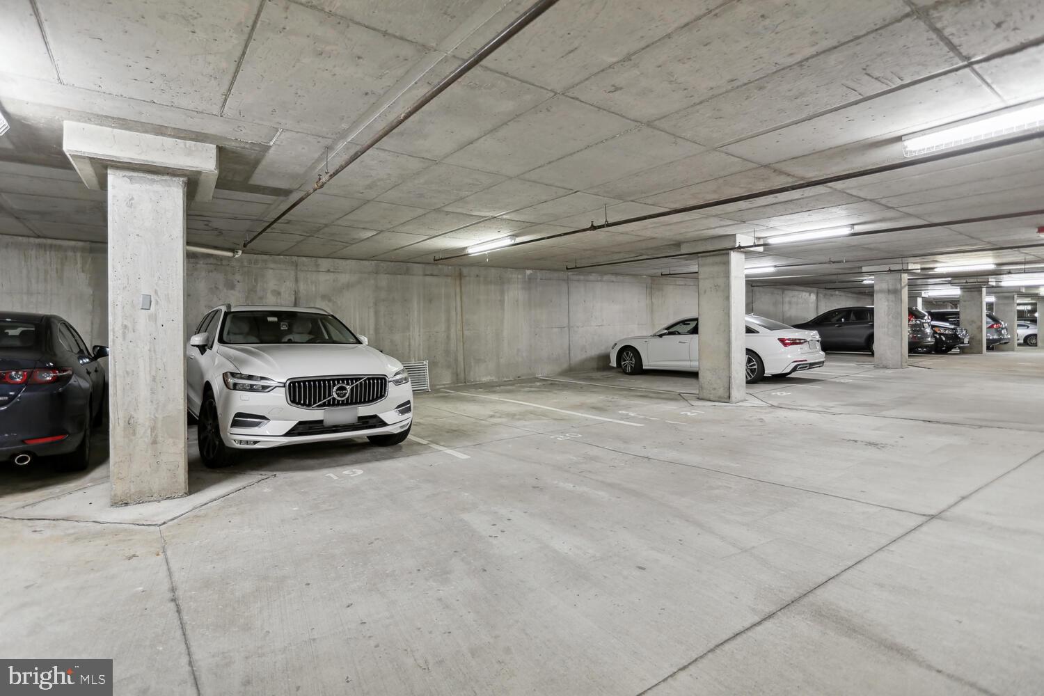 444 West Broad Street, Unit 619 Falls Church, VA 22046 - Photo 16 of 21 a view of parking garage with cars parked