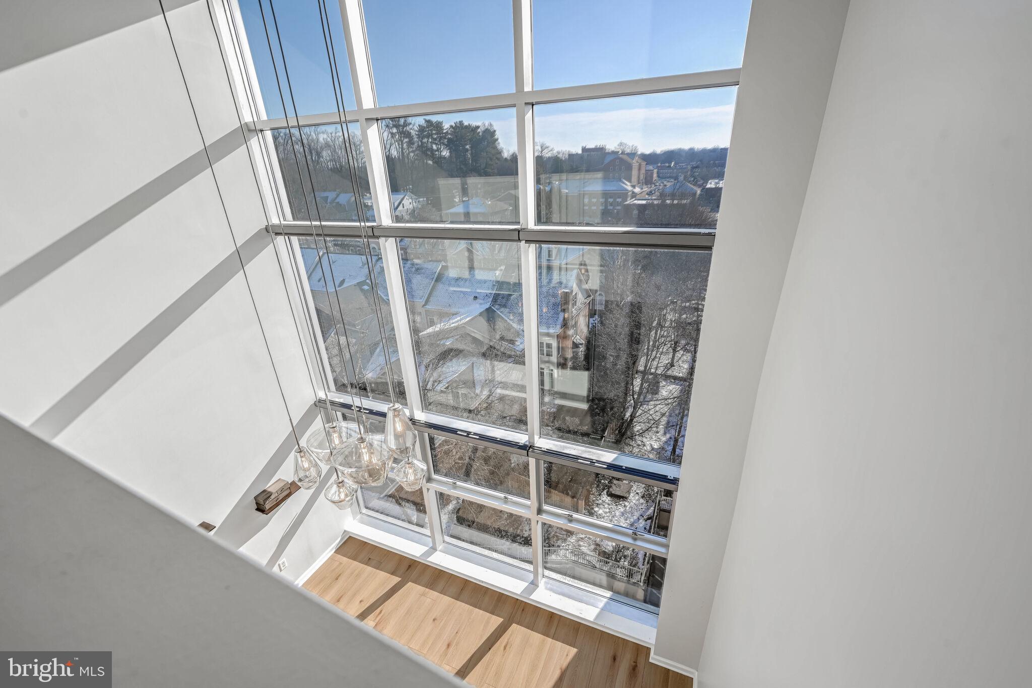 444 West Broad Street, Unit 619 Falls Church, VA 22046 - Photo 10 of 21 a view of a balcony with wooden floor