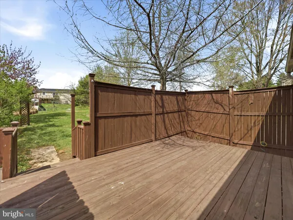 a view of backyard with wooden floor