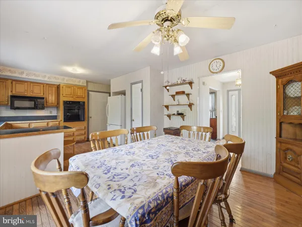 a view of a dining room with furniture
