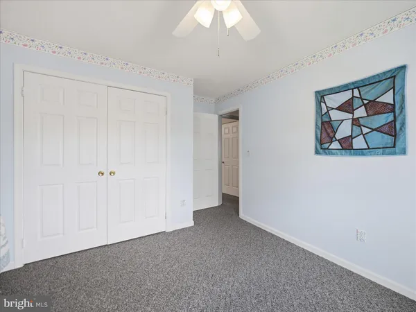 a room with furniture and window