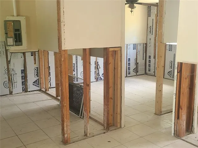 a bathroom with a glass door shower