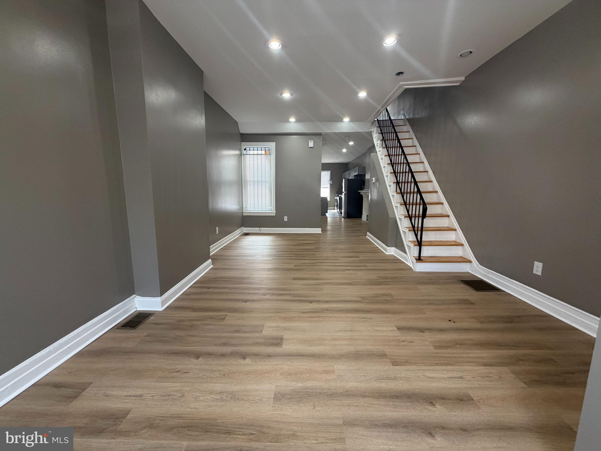 2260 North 18th Street Philadelphia, PA 19132 - Photo 2 of 13 a view of an empty room with wooden floor