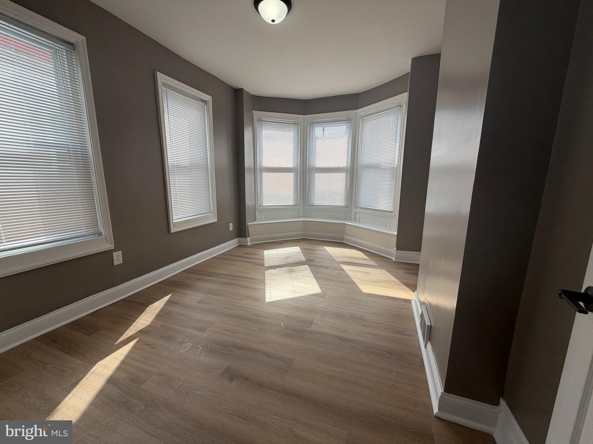 2260 North 18th Street Philadelphia, PA 19132 - Photo 10 of 13 a view of an empty room and window
