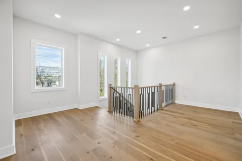 a view of entryway with wooden floor