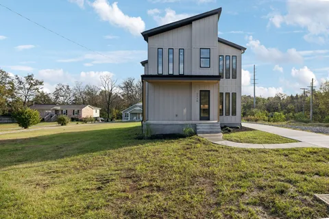 a house view with a garden space