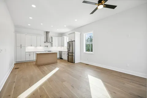 a view of a kitchen with a sink cabinets and window