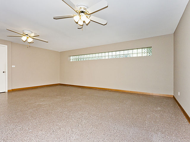 869 Spring Road Elmhurst, IL 60126 - Photo 13 of 25 a view of an empty room with a window