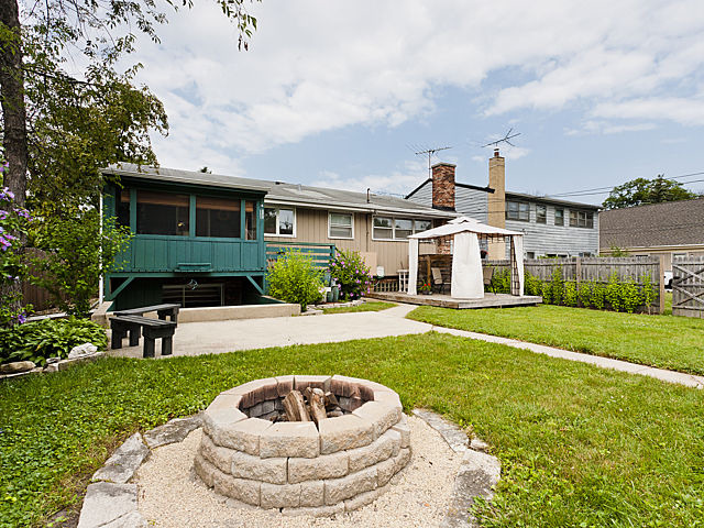869 Spring Road Elmhurst, IL 60126 - Photo 21 of 25 a front view of a house with a yard