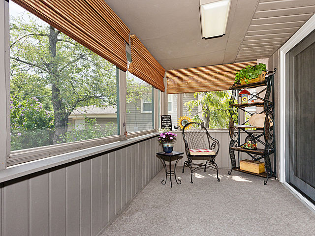 869 Spring Road Elmhurst, IL 60126 - Photo 5 of 25 a view of a room with furniture and a porch