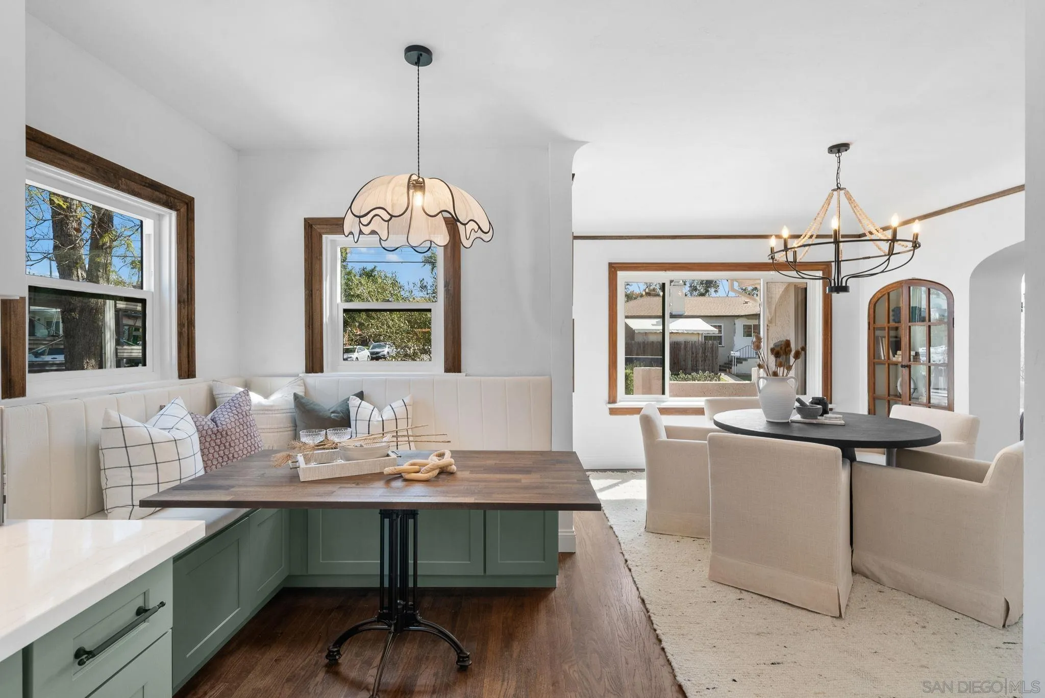4052 Alder Drive San Diego, CA 92116 - Photo 15 of 28 a dining room with furniture and window