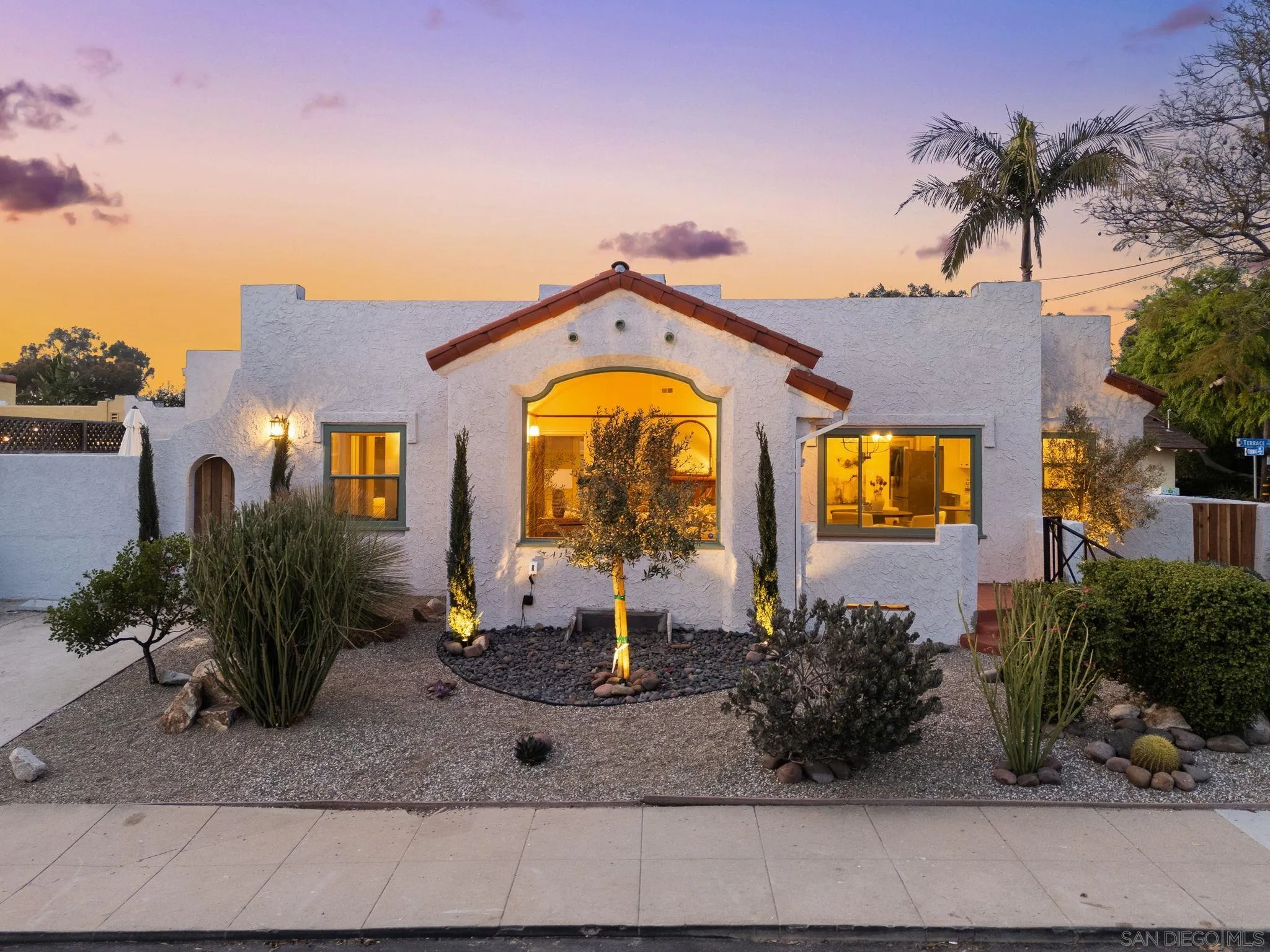 4052 Alder Drive San Diego, CA 92116 - Photo 2 of 28 a house view with a garden space