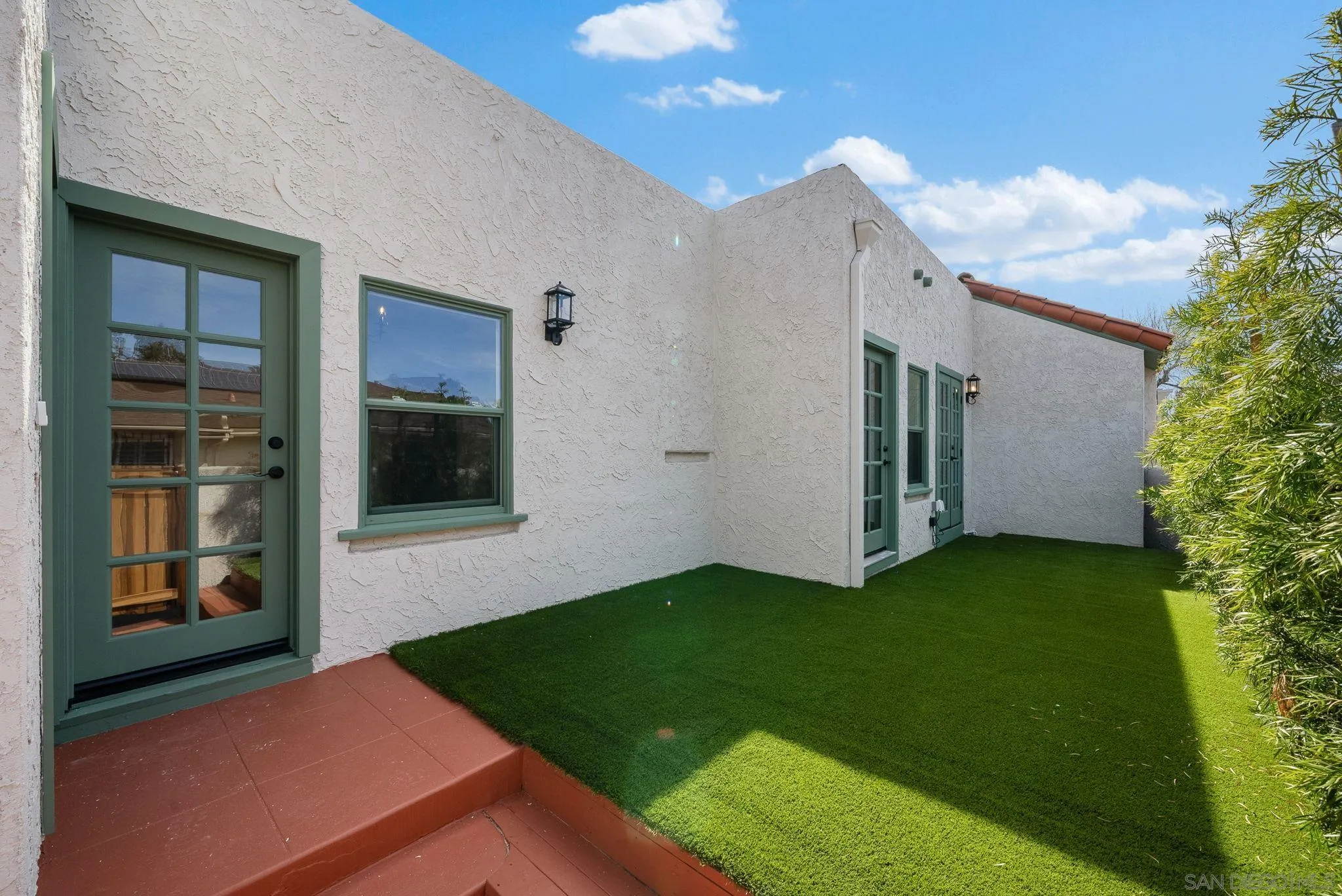 4052 Alder Drive San Diego, CA 92116 - Photo 27 of 28 a backyard of a house with seating space