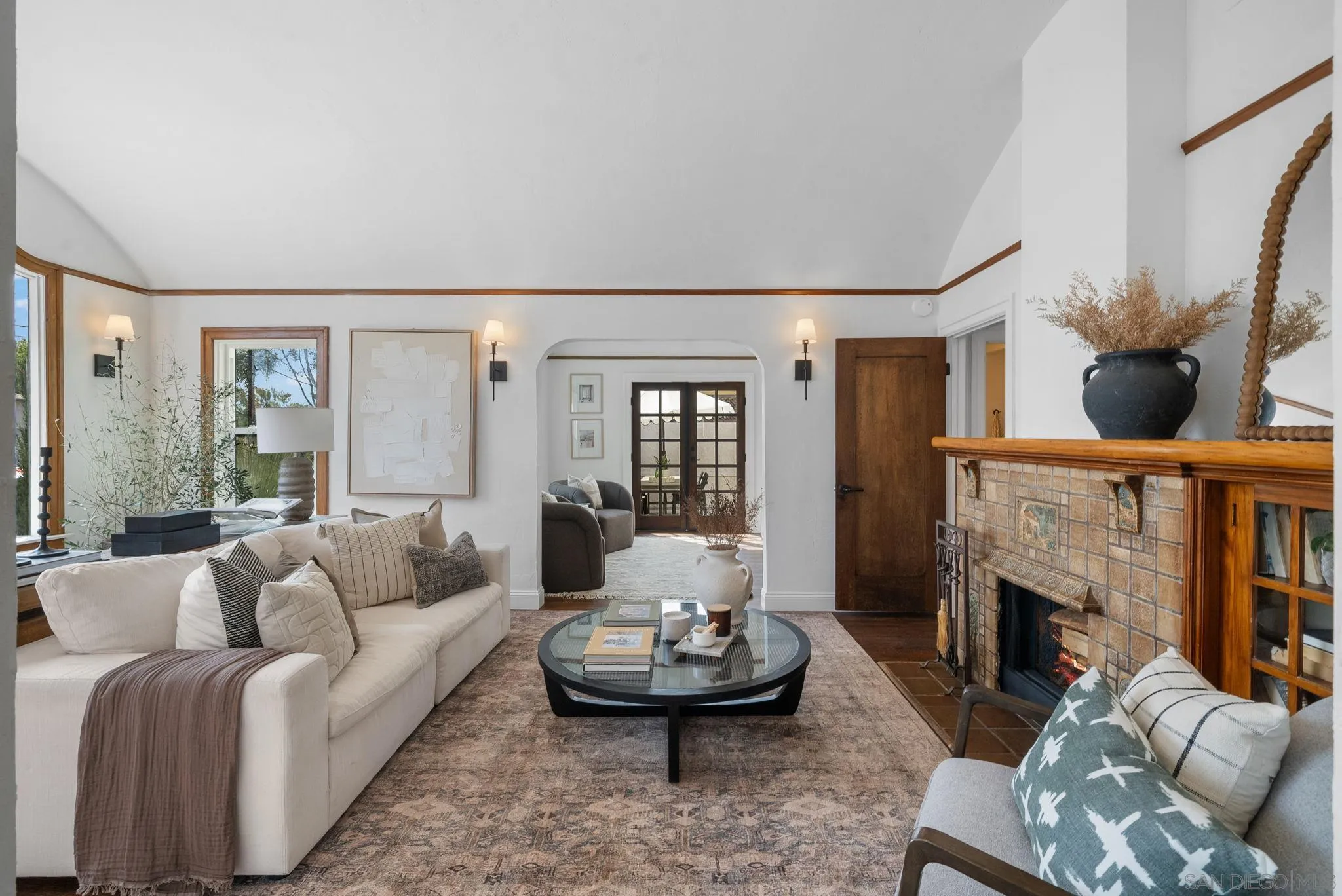 4052 Alder Drive San Diego, CA 92116 - Photo 5 of 28 a living room with furniture and a fireplace