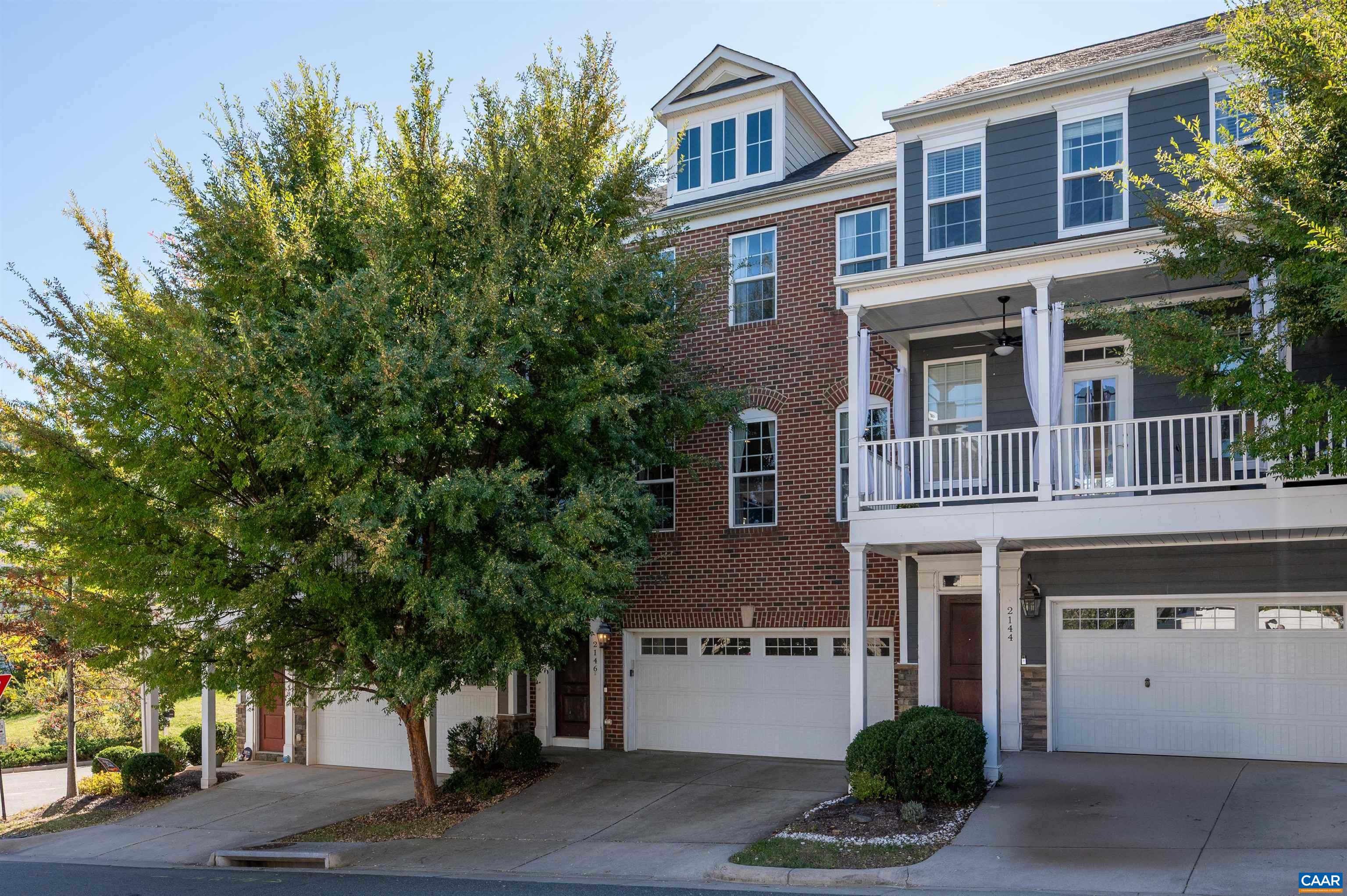2146 Avinity Loop Charlottesville, VA 22902 - Photo 1 of 27 a house that has a tree in front of it