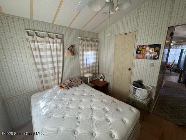 320 Akron Way Rockledge, FL 32955 - Photo 16 of 24 a bedroom with a bed a flat screen tv and dresser