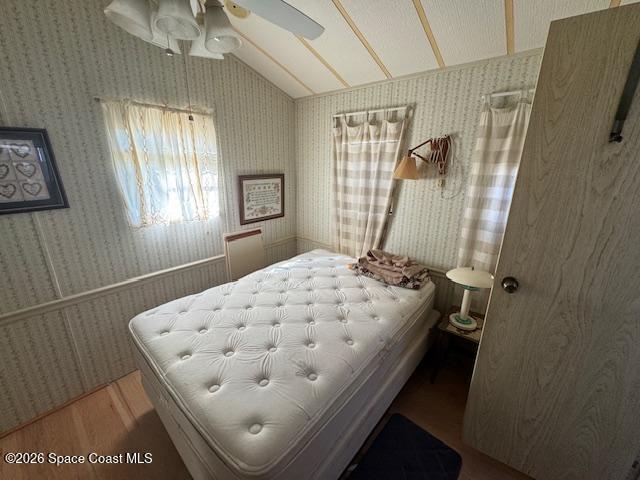 320 Akron Way Rockledge, FL 32955 - Photo 17 of 22 a bedroom with a bed and a window