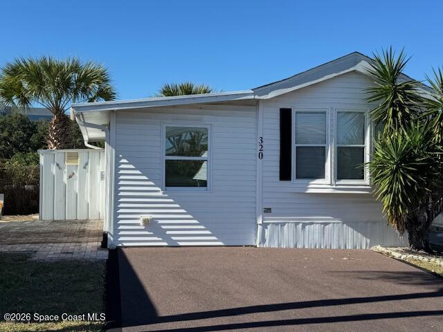 320 Akron Way Rockledge, FL 32955 - Photo 24 of 24 a view of a house with a yard and plants