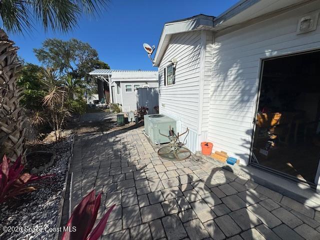 320 Akron Way Rockledge, FL 32955 - Photo 8 of 22 a backyard of a house with outdoor seating