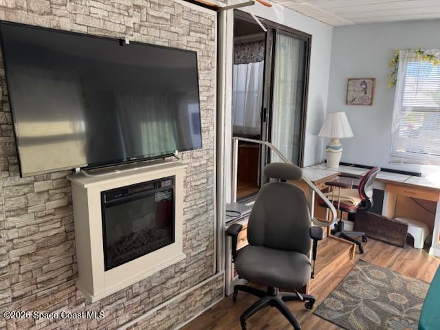 320 Akron Way Rockledge, FL 32955 - Photo 10 of 22 a living room with furniture and a fireplace