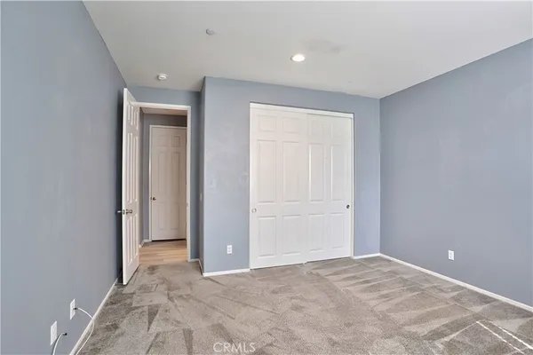 a bathroom with a toilet sink and a shower